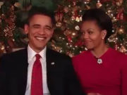 Michelle Obama giving the stink-eye to the president as he cracks up during filming of their 2012 Christmas address