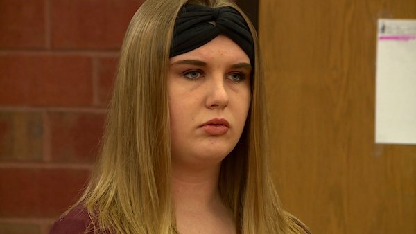 Brianna Brochu appears in court to answer charges that she contaminated her then-roommate's belongings with bodily fluids